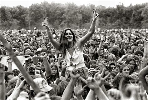 what was the purpose of the woodstock music festival? what if it was a global event to promote peace and unity?